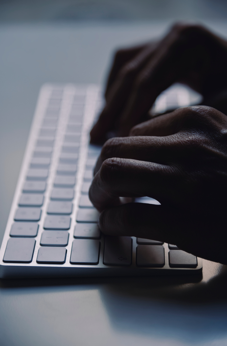 Young Man Typing 